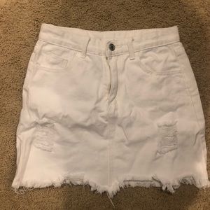 White distressed denim skirt